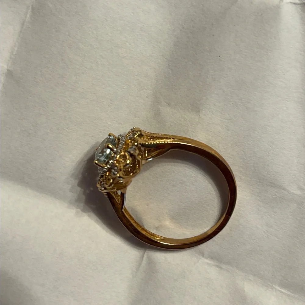 Oval Aquamarine 1/10 CT. T.W.Diamond Frame Vintage-Style Ornate Ring in 10K Gold - Picture 4 of 7